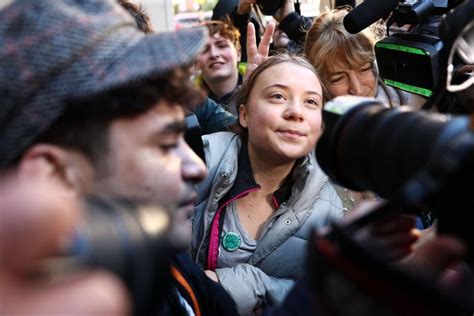 Greta Thunberg attends a London court hearing after police charged her with a public order offense